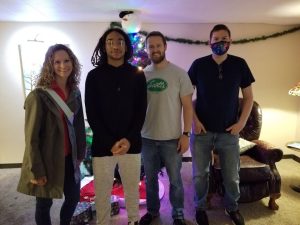 Couples enjoying a Christmas themed escape room experience in Columbus Ohio at Escape It Grandview