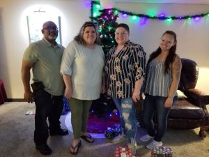 Group enjoying a Christmas themed date night escape room experience in Columbus Ohio at Escape It Grandview