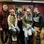 Double date group enjoying a speakeasy escape room experience in Columbus Ohio at Escape It Grandview