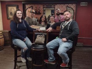 Small group of friends enjoying an escape game experience in Columbus Ohio at Escape it Grandview