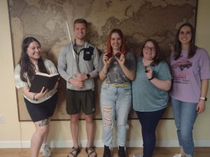 Group celebrating their escape room victory in Columbus Ohio at Escape It Grandview