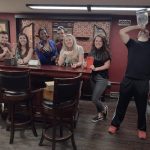 Group enjoying a live escape room experience in Columbus Ohio at Escape It Grandview