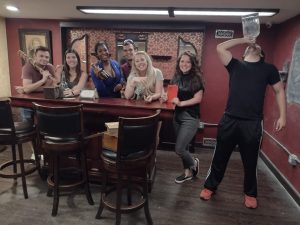 Group enjoying a live escape room experience in Columbus Ohio at Escape It Grandview