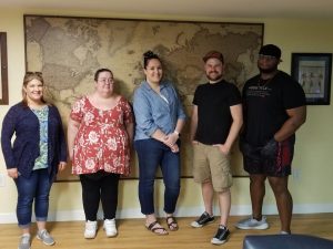 Group of friends after completing an escape game in Columbus Ohio at Escape AIt Grandview