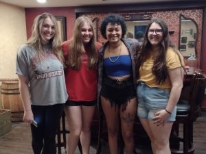 Group of friends enjoying an escape room experience in Columbus Ohio