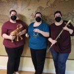 small group celebrating after completing and escape room in Columbus Ohio at Escape it Grandview