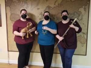 small group celebrating after completing and escape room in Columbus Ohio at Escape it Grandview